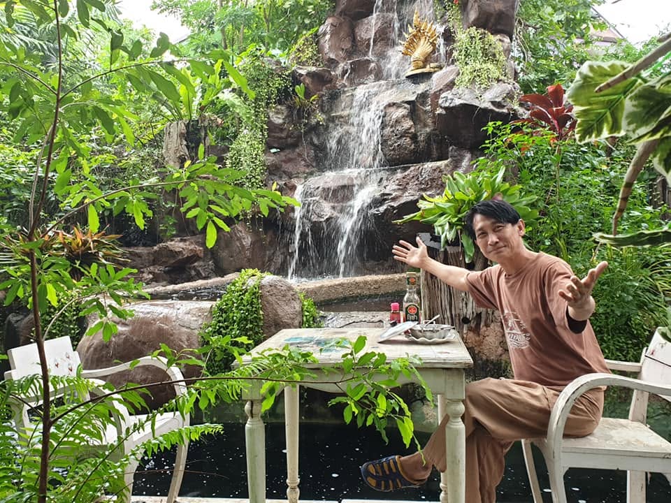 A warm welcome by the waterfall