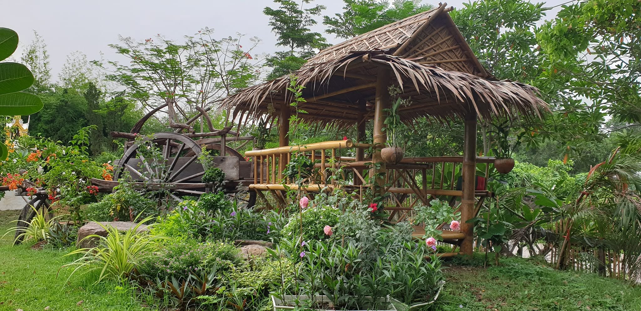 Bamboo sala seating among the flowers