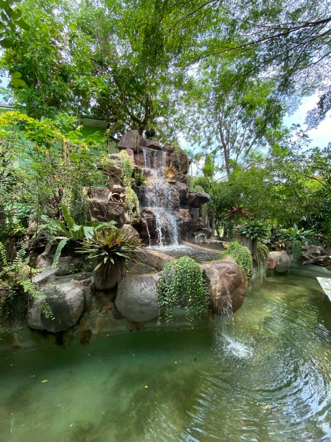 Rock waterfall and pond